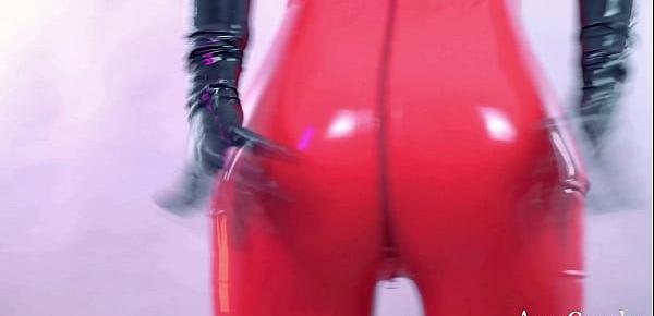  Amazing hot Domme in red latex catsuit teasing close up shiny fetish clothes